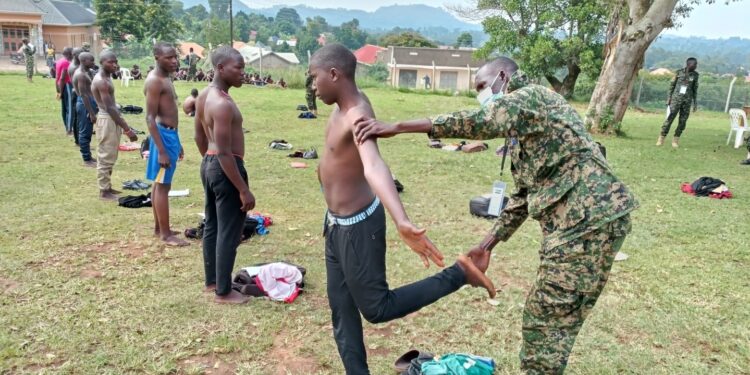 🚨 13 Arrested for Forged Academic Documents During UPDF Recruitment in Kagadi