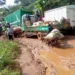 Trucks Stranded as Zombo Border Road Becomes Impassable